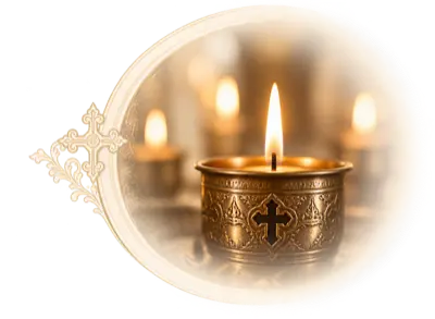 Lumânare ortodoxă aprinsă în lumină de candelă